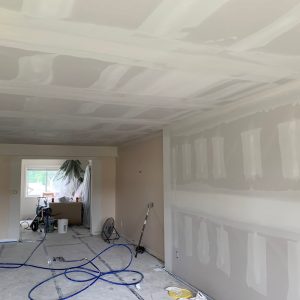 632691411_122095600461273762_7027183460552137542_n Drywall taping in progress in a living room, Victoria BC