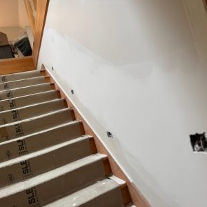 648734617_122105100567273762_8701219355000444175_n Taped and finished drywall along a staircase in a Victoria, BC home