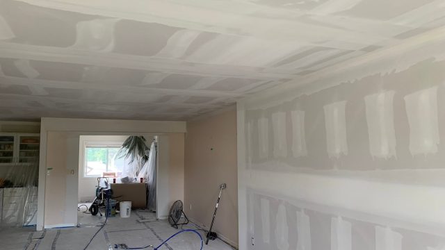 Drywall taping in progress in a living room, Victoria BC