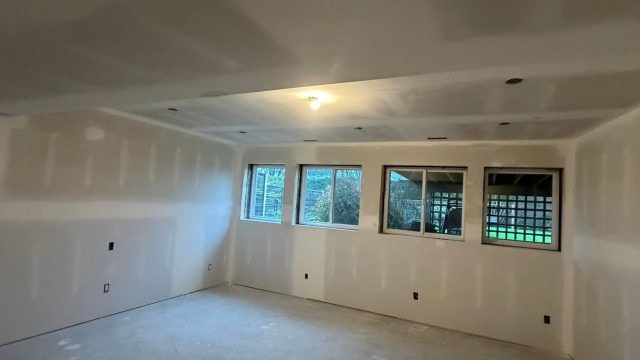 Taped and finished drywall in a renovated room, Victoria BC